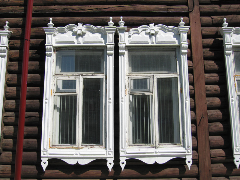 Памятник деревянного зодчества по улице Коммунистическая (Гудимовская), дом 19 в историческом центре Новосибирска – Ново-Николаевска.