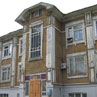 Памятник деревянного зодчества по улице Коммунистическая (Гудимовская), дом 13 в историческом центре Новосибирска – Ново-Николаевска